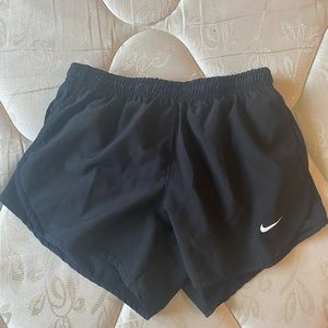 Black Nike running shorts